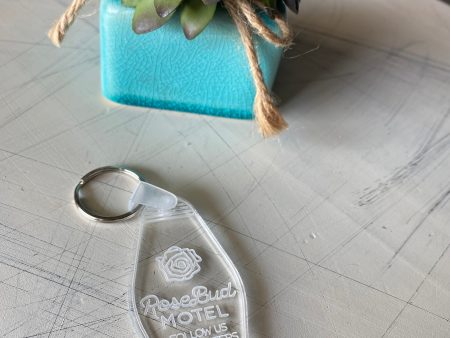 Rosebud Motel - Follow us on tweeters - Clear Motel-style Keychain Online now